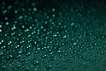 Abstract green bokeh texture on green background