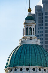 The old courthouse in St. Louis, MO as seen from the western side with the Gateway Arch seen behind...