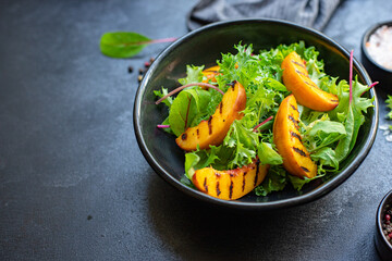 salad peach grilled lettuce leaves mix nectarine natural serving size healthy top view place for text copy space 
