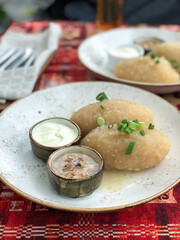 Potato stuffed dumplings servering in the plate