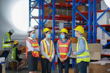 Manager with worker team working warehouse. During working hours in the warehouse, there is a checking, checking, stock for quality products, safe for customers. people worker in warehouse concept.