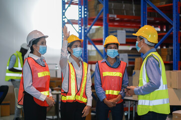 Warehouse manager teaches skills in taking care of products, counting inventory, wearing masks. And social distance
