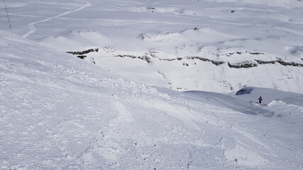 Obraz premium Skiing in the beautiful mountains of the Laax ski resort in Flims, Switzerland