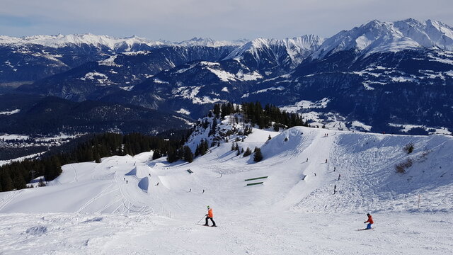 Skiing in the beautiful mountains of the Laax ski resort in Flims, Switzerland