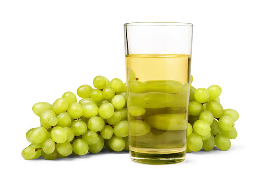 Bunch of sweet green grape and glass of fresh fruit juice isolated on white background.