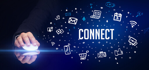 hand holding wireless peripheral with CONNECT inscription, social media concept