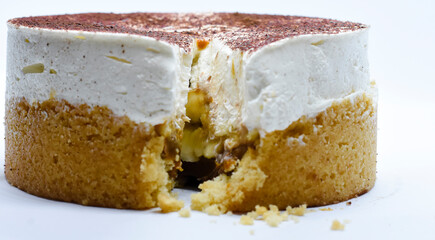 Dessert with whipped cream, biscuit, banana and dulce de leche called Banoff