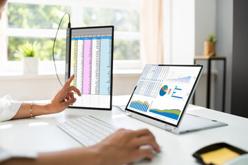 Analyst Employee Working With Spreadsheet Report