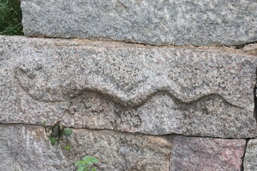 
handicraftsmen on stone in olden days 
