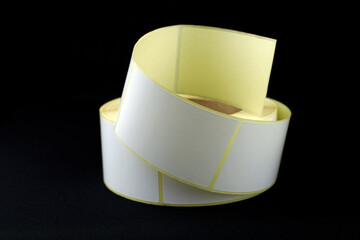 White roll of labels for thermal perforation. Stickers for thermal or thermal transfer printing....