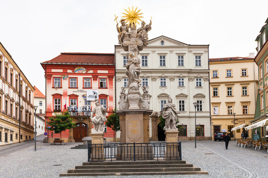 BRNO, CZECH - SEPTEMBER 25, 2015: - Holy Trinity Column and Husa Theatre (Divadlo husa na provazku) on Cabbage Market Square (Zelny trh) in Brno. The monument in Baroque style era was erected in1729