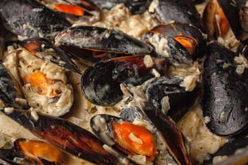 Moules Marinieres - Mussels cooked with white wine sauce.