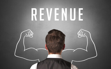 Rear view of a businessman with REVENUE inscription, powerfull business concept