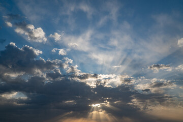 Sunbeam through the haze on blue sky: can be used as background and dramatic look