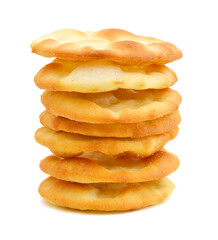 A stack of cheesy rice crackers on a white background.