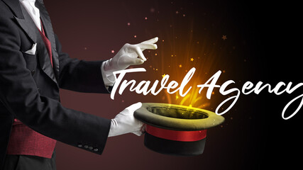 Magician is showing magic trick with Travel Agency inscription, traveling concept