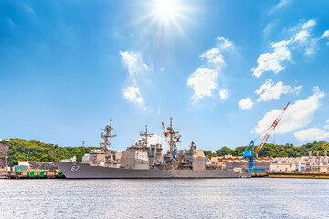Fototapeta premium yokosuka, japan - july 19 2020: Wide angle view of the American USS Shiloh CG-67, a Ticonderoga-class guided missile cruiser of United States Navy berthed in the Japanese Yokosuka naval base.