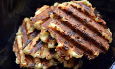 Grilling curd waffles. Sweet pastries.