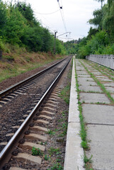 Fototapeta na wymiar Railway. Paths. Rails and sleepers. Station in the village. Journey.