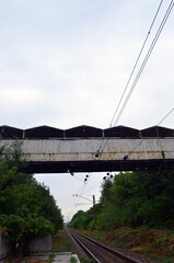 Iron bridge over the railroad tracks.