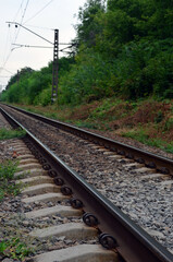 Obraz premium Railway. Paths. Rails and sleepers. Station in the village. Journey.