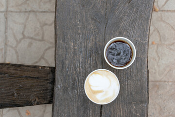 cups of coffee on wooden table