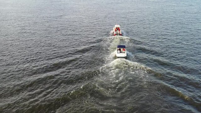 Aerial Drone View of Tow Boat Towing a Disabled Boat