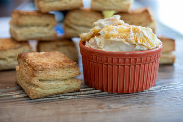 Flaky Biscuit with Large Dish of Clotted Cream