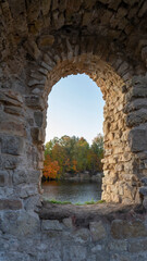 Fototapeta na wymiar Autumn Landscape of Old Koknese Castle Ruins and River Daugava Located in Koknese Latvia. Medieval Castle Remains in Koknese.