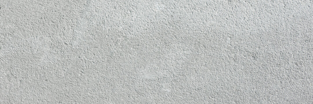 surface of the new light-colored cement-based wall plaster.