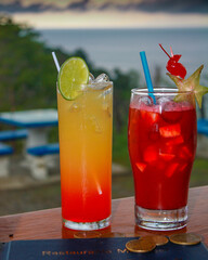 Fruity drinks with ocean in background