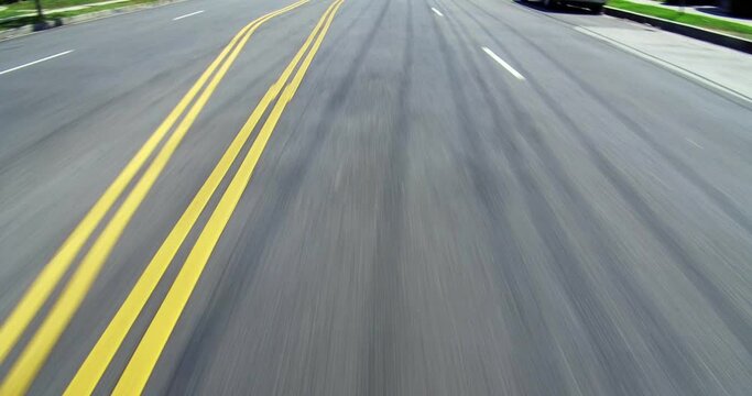 Fast driving motion on the street road during rush hour traffic in Los Angeles, California, 4K