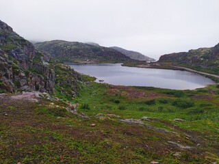 Lake in the mountains on the shore of the Barents sea
