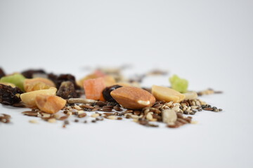 different views of nuts and seeds on a white background