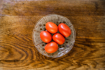 tomatoes on a wooden background