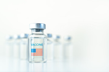 Transparent vials with USA flag. Vaccine for covid-19 coronavirus, flu, infectious diseases. Injection after clinical trials for vaccination of human, child, adult, senior. Medicine, drug concept