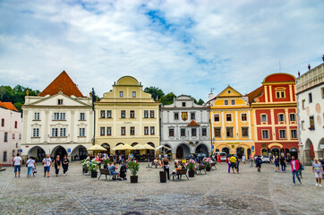 Obraz premium Cesky Krumlov, The Czech Republic: Vintage picturesque old town with colorful houses and chapel of church