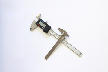 Very old used rusty iron calipers and Digital electronic vernier calipers isolated on white background