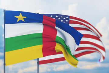 Waving American flag and flag of Central African Republic. Closeup view, 3D illustration.