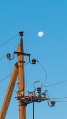 Electric pole with high-voltage wires and insulators