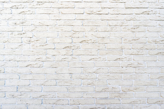 White brick wall. Texture of brick with white filling