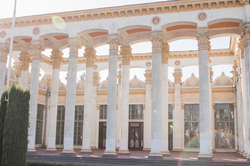 Fototapeta premium old building with columns in park on a clear day
