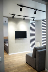 Small room with sofa and TV. The concept of interior, home and comfort