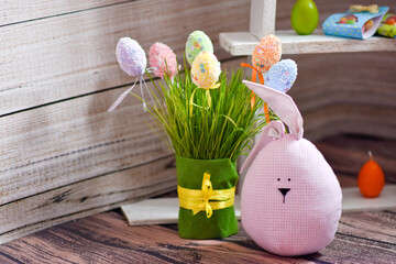 Easter attributes with a smiley face on the background