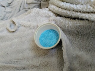 washing powder in plastic cup