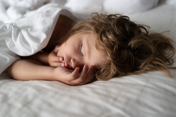 Adorable small kids rest asleep enjoy good healthy peaceful sleep or nap. Six years old Kid...