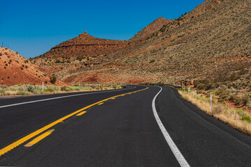 Fototapeta na wymiar Empty scenic highway in Arizona, USA. Panoramic skyline with empty road.
