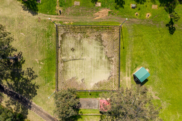 An old unused tennis court in a public park in a small regional township
