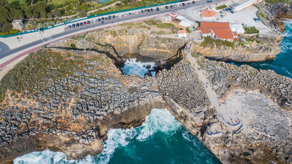 Aerial view of Boca do Inferno, rock formation of Cascais, Portugal. Cliffs by the sea in Cascais
