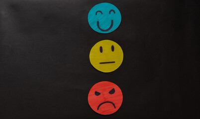 Hand choosing green paper cut happy smile face, feedback rating and positive customer review,...